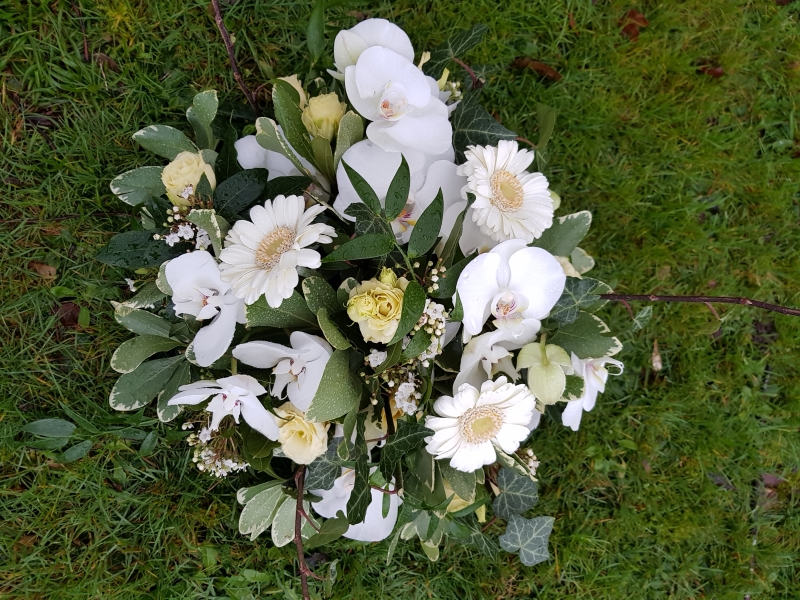 white and green funeral round posy arrangement